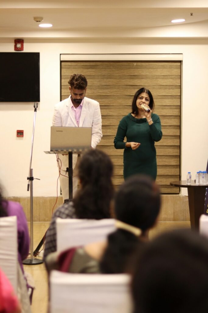 pexels-photo-31770764-31770764 Business professionals presenting at a corporate event in Ahmedabad, India.